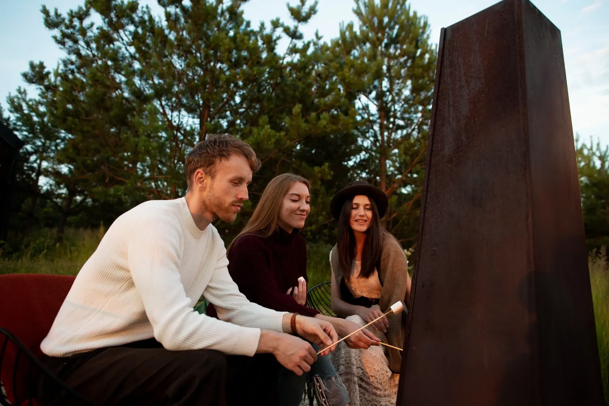 A group of friends relaxing outdoors highlights the accessible community location of our addiction treatment center in Sedalia, MO.