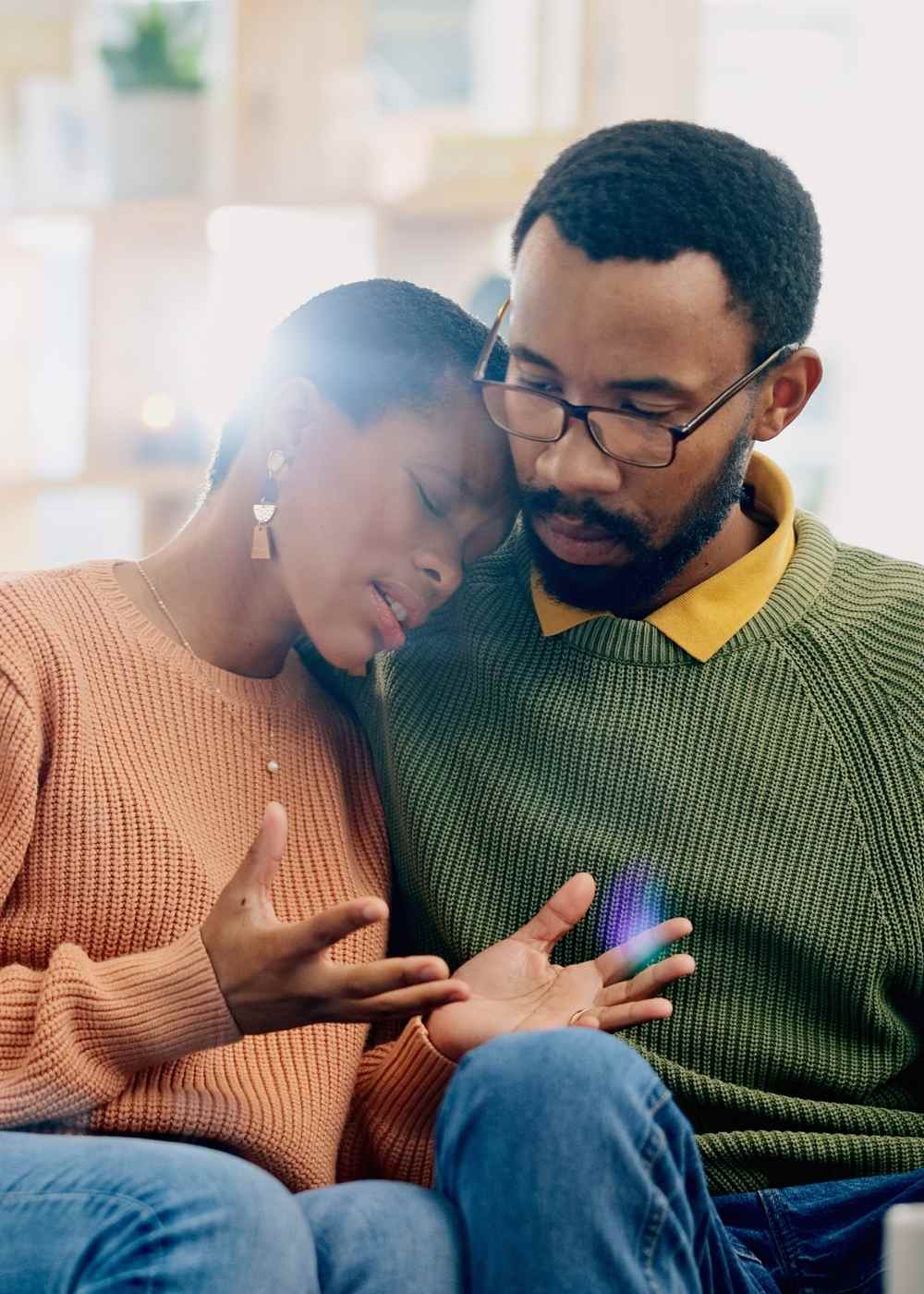 Couple showing emotional support during addiction recovery conversation