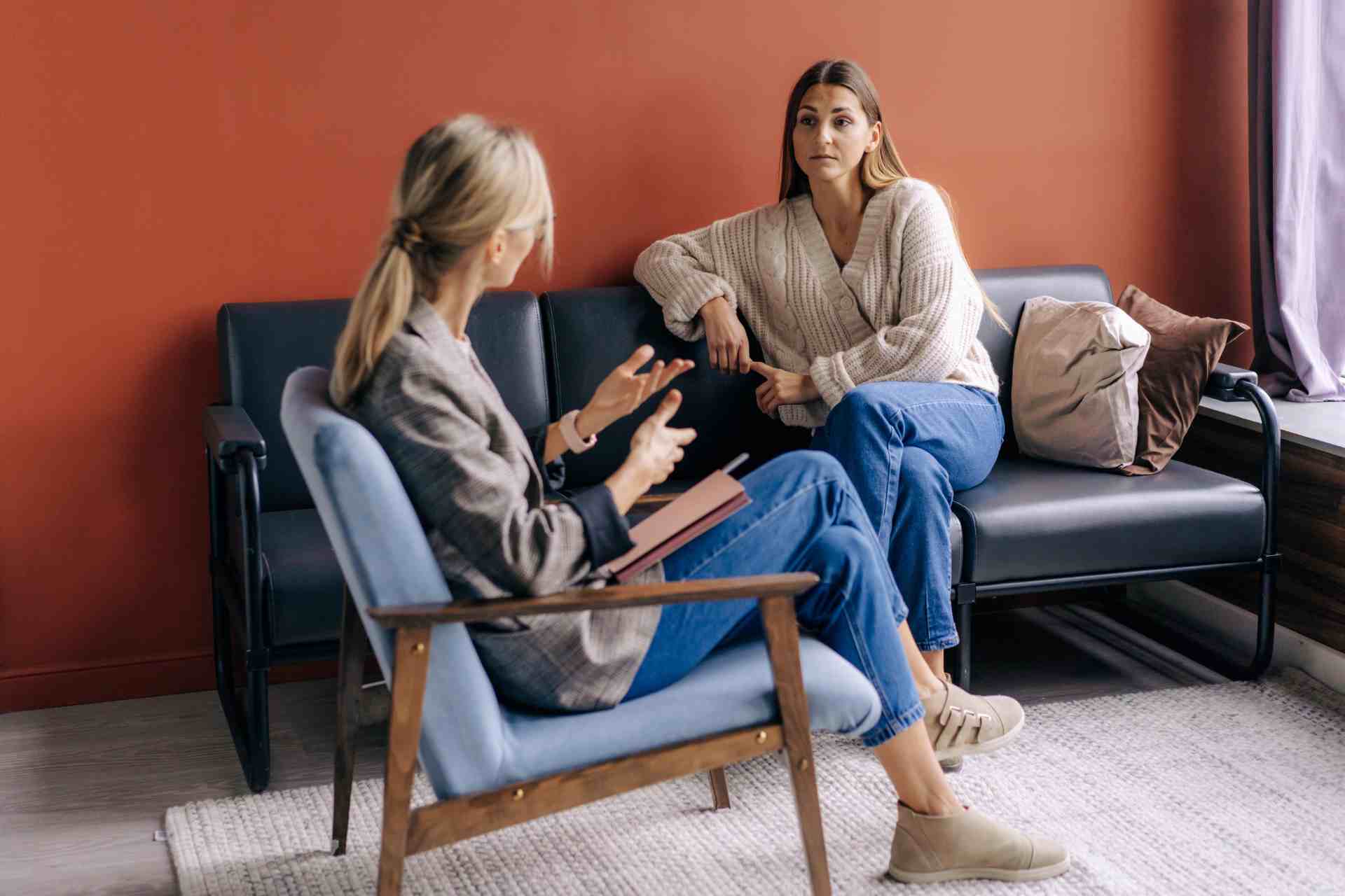 Woman speaking with a therapist during a mental health counseling session